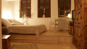 Comfort Apartment, City View | Living area | Flat-screen TV, DVD player