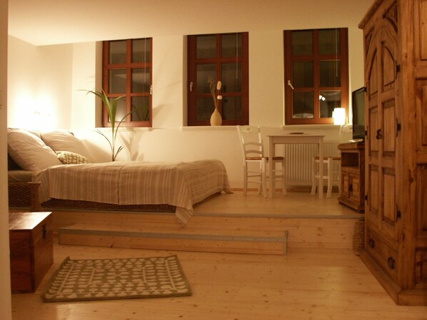 Comfort Apartment, City View | Living area | Flat-screen TV, DVD player