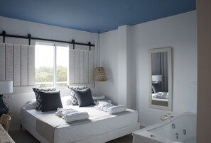 Kamar Double Deluks, jet tub | Brankas, setrika/meja setrika, Wi-Fi gratis, dan seprai linen