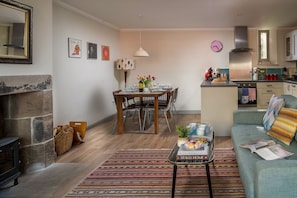 Smart TV, fireplace, books