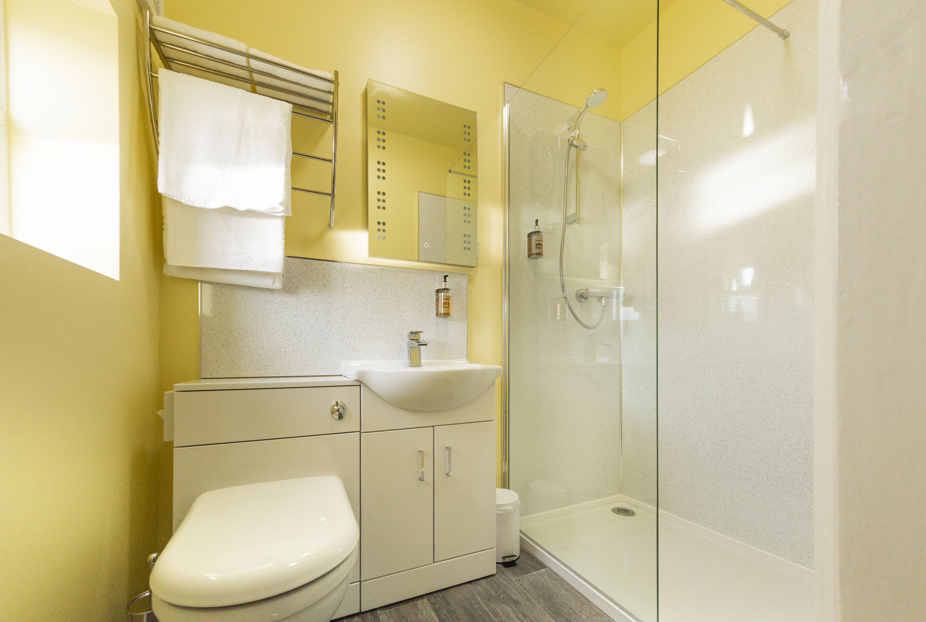 classic twin room | bathroom | hair dryer, towels, toilet paper