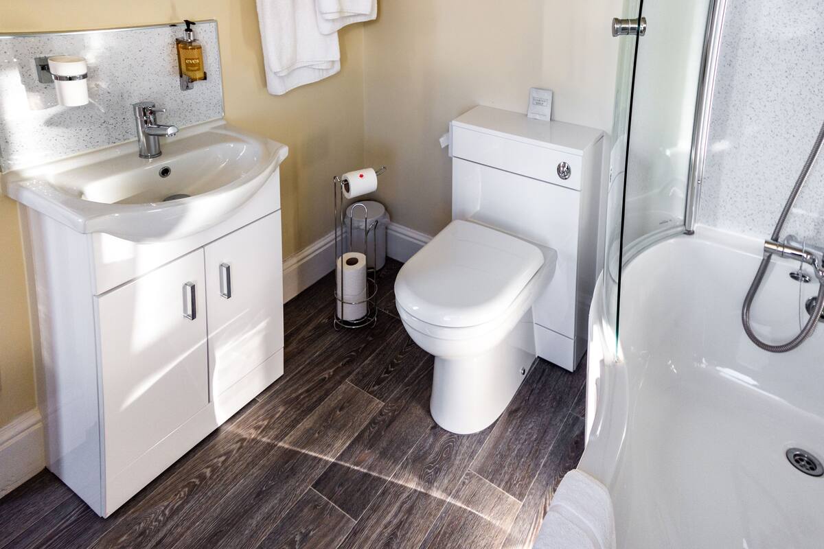 superior room, 1 king bed | bathroom | hair dryer, towels, toilet paper