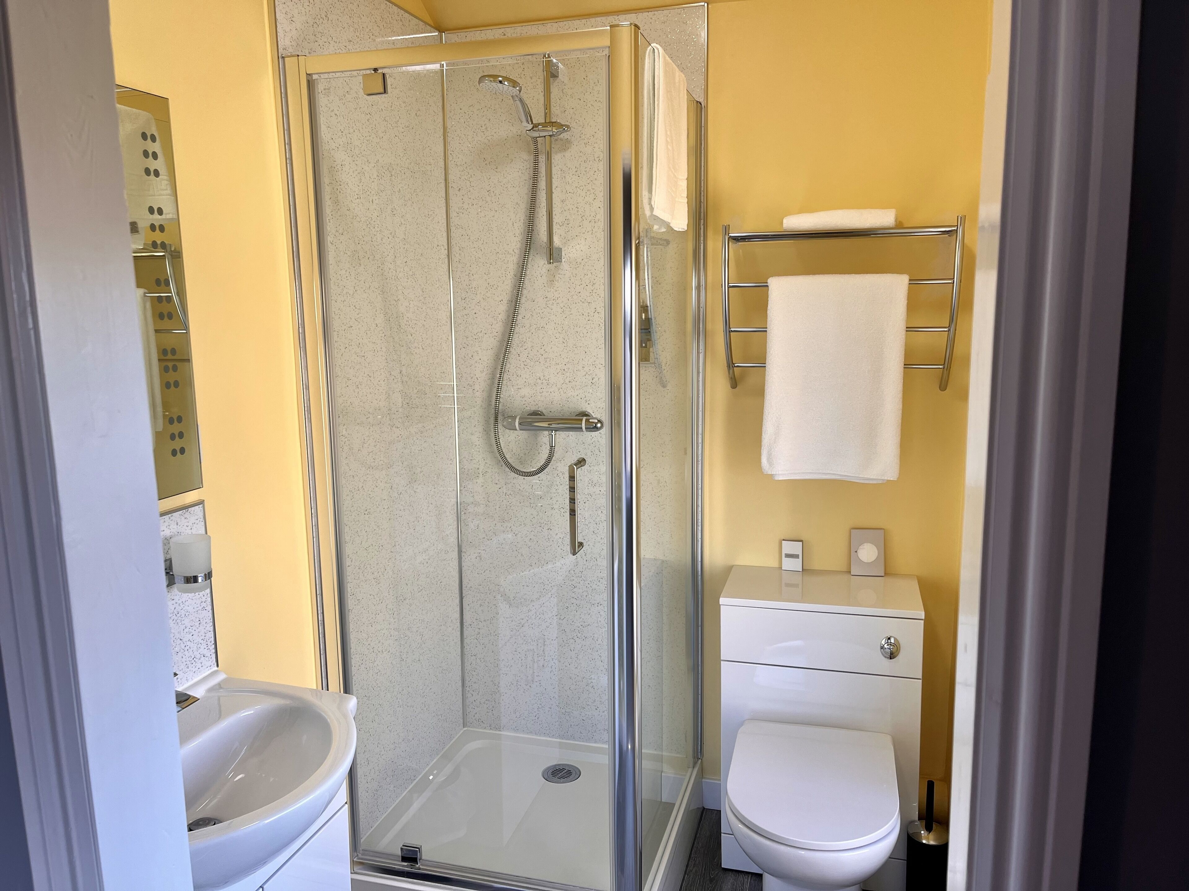 classic single room | bathroom | hair dryer, towels, toilet paper