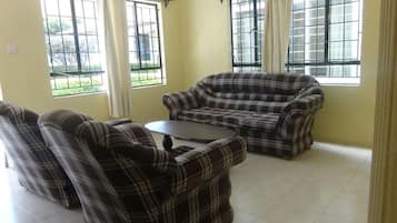 Villa, 3 Bedrooms | Living room | 32-inch flat-screen TV with cable channels, LCD TV