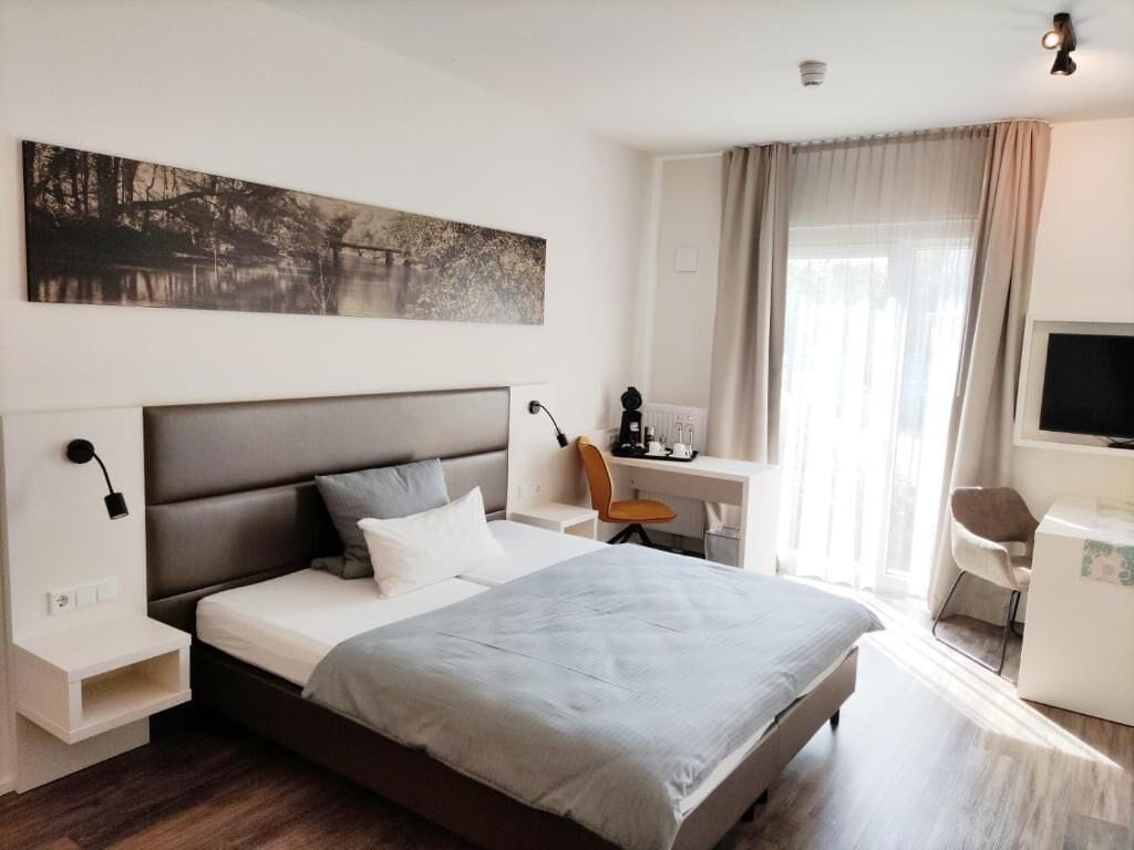 junior studio suite, 1 double bed with sofa bed, accessible | 1 bedroom, desk, laptop workspace, soundproofing