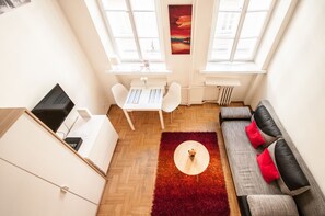 Deluxe appartement | Woonruimte | Een flatscreentelevisie