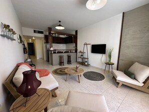 Superior Apartment, Oceanfront | Living room