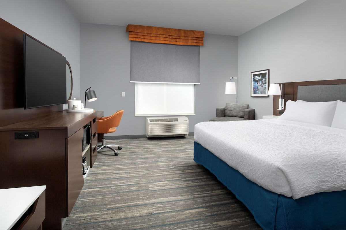 Room, 1 King Bed, Accessible (Roll-In Shower) | In-room safe, desk, laptop workspace, blackout curtains