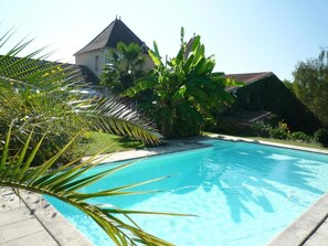 Outdoor pool, pool umbrellas, pool loungers