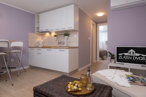 City Apartment, 1 Bedroom, Patio, Ground Floor (Bava) | Private kitchenette | Mini-fridge, stovetop, dishwasher, espresso maker