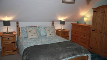 Suite, 1 King Bed, Hill View | Individually decorated, individually furnished, desk, blackout drapes