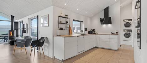 Fridge, stovetop, dishwasher, coffee/tea maker