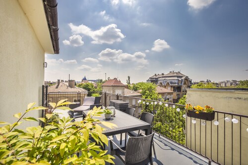 Enjoy the large terrace of your new apartment near the City Park!