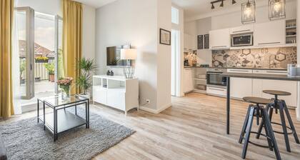 Enjoy the large terrace of your new apartment near the City Park!