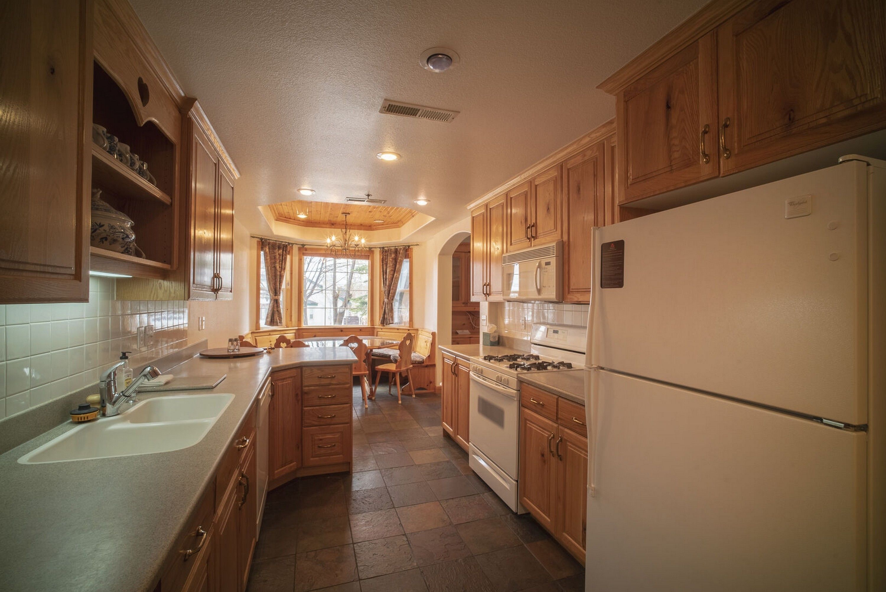 Townhome, 3 Bedrooms | Private kitchen | Full-sized fridge, microwave, oven, stovetop