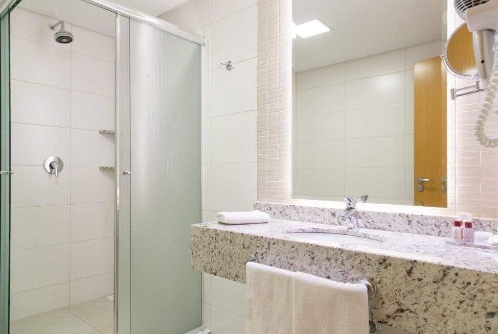 deluxe room | bathroom | free toiletries, hair dryer, towels, soap