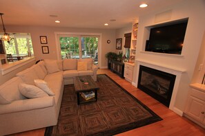 Smart TV, fireplace, DVD player, books - 40 Ploughed Neck Rd- Pet-friendly Oasis: .5 Mile to Beach, Central A/C, Hot Tub! (East Sandwich)