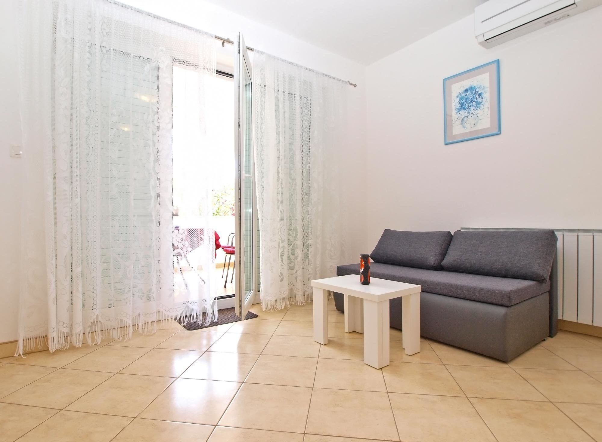 Standard Apartment, 2 Bedrooms (0133) | Living room | Flat-screen TV