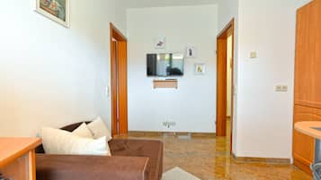 Apartamento standard, 1 quarto (336/768) | Área de estar | TV