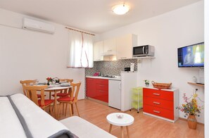 Standard Apartment, 1 Bedroom (358/827) | Living area | TV - Apartment 358 (Porec)