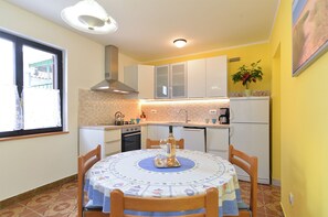 Standard Apartment, 2 Bedrooms (0213) | Private kitchen | Fridge, oven, stovetop, coffee/tea maker - Apartment 745 (Pula)