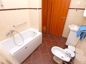 Standard House, 2 Bedrooms (0324) | Bathroom | Separate tub and shower, deep soaking tub, hair dryer, bidet