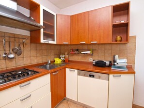 Standard Apartment, 2 Bedrooms (0339) | Private kitchen | Fridge, microwave, oven, stovetop - Apartment 1383 (Pula)