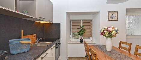 Standard Apartment, 1 Queen Bed with Sofa bed (0360) | Private kitchen | Fridge, microwave, electric kettle