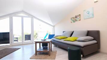 Standard Apartment, 2 Bedrooms (1418/13268) | Living area | Flat-screen TV