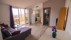 Standard Apartment, 2 Bedrooms (0388) | Living area | Flat-screen TV