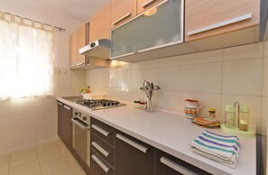 Standard Apartment, 2 Bedrooms (0398) | Private kitchen | Fridge, microwave, coffee/tea maker, electric kettle