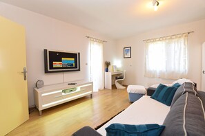 Standard Apartment, 2 Bedrooms (0398) | Living area | TV