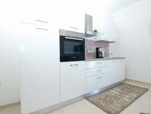 Standard Apartment, 2 Bedrooms (1617/16661) | Private kitchen | Fridge, microwave, oven, stovetop - Apartment 1617 (Vodnjan)