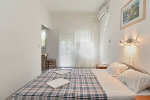 1 habitación, tabla de planchar con plancha, wifi gratis y ropa de cama 