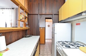 Standard Apartment, 2 Bedrooms (1684/17450) | Private kitchen | Fridge, stovetop, electric kettle, cookware/dishes/utensils - Apartment 1684 (Pula)