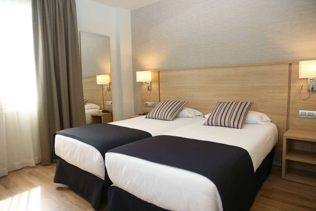 desk, laptop workspace, blackout curtains, free wifi