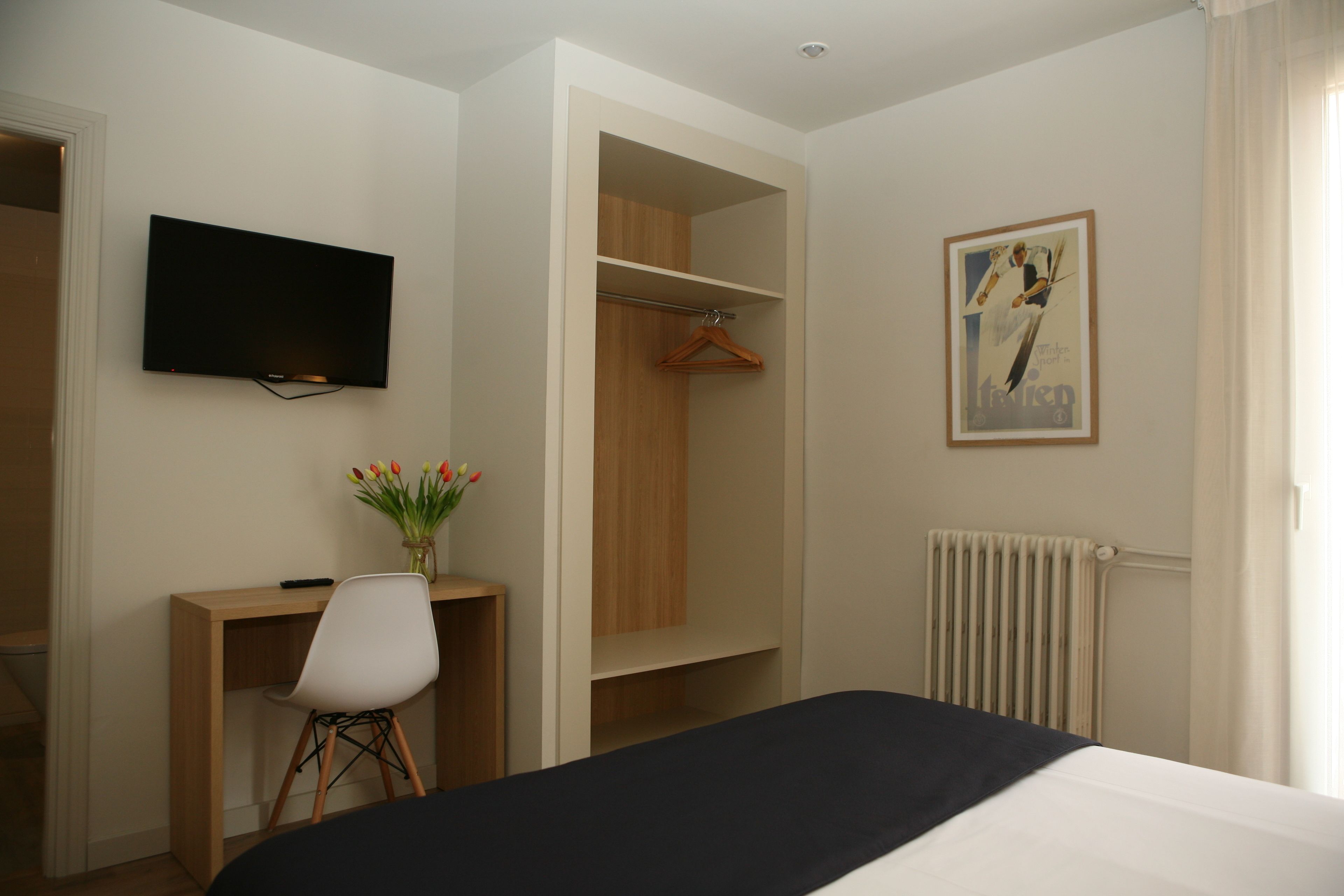 desk, laptop workspace, blackout curtains, free wifi