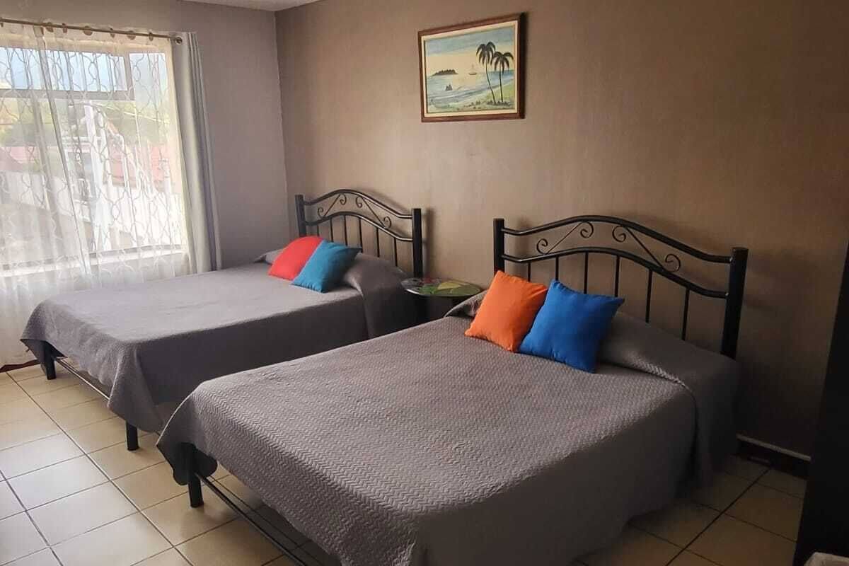Family Room, Multiple Beds | Desk, soundproofing, iron/ironing board (on request), WiFi (free)