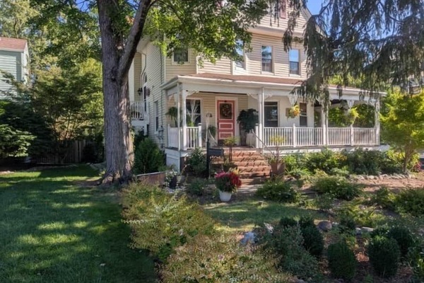Front view of Chez Sherry@216. You enter the apartment on the left side of house up the side stairs.
