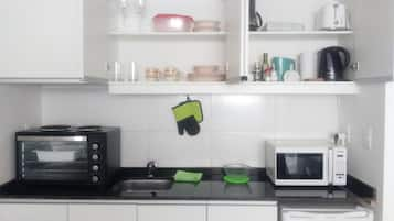 Apartment, 1 Double Bed | Private kitchenette | Full-sized fridge, microwave, oven, stovetop