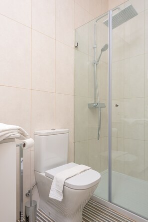 Hair dryer, towels, soap, shampoo