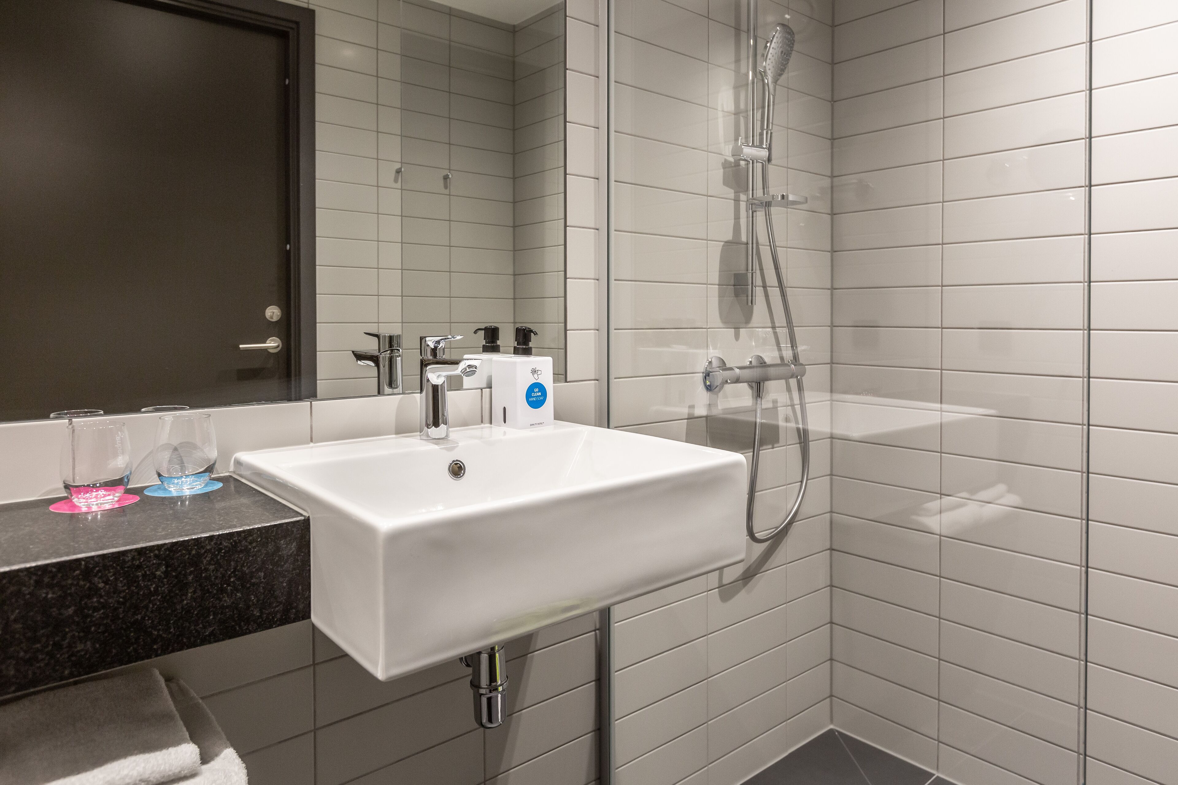 hair dryer, towels, soap, shampoo