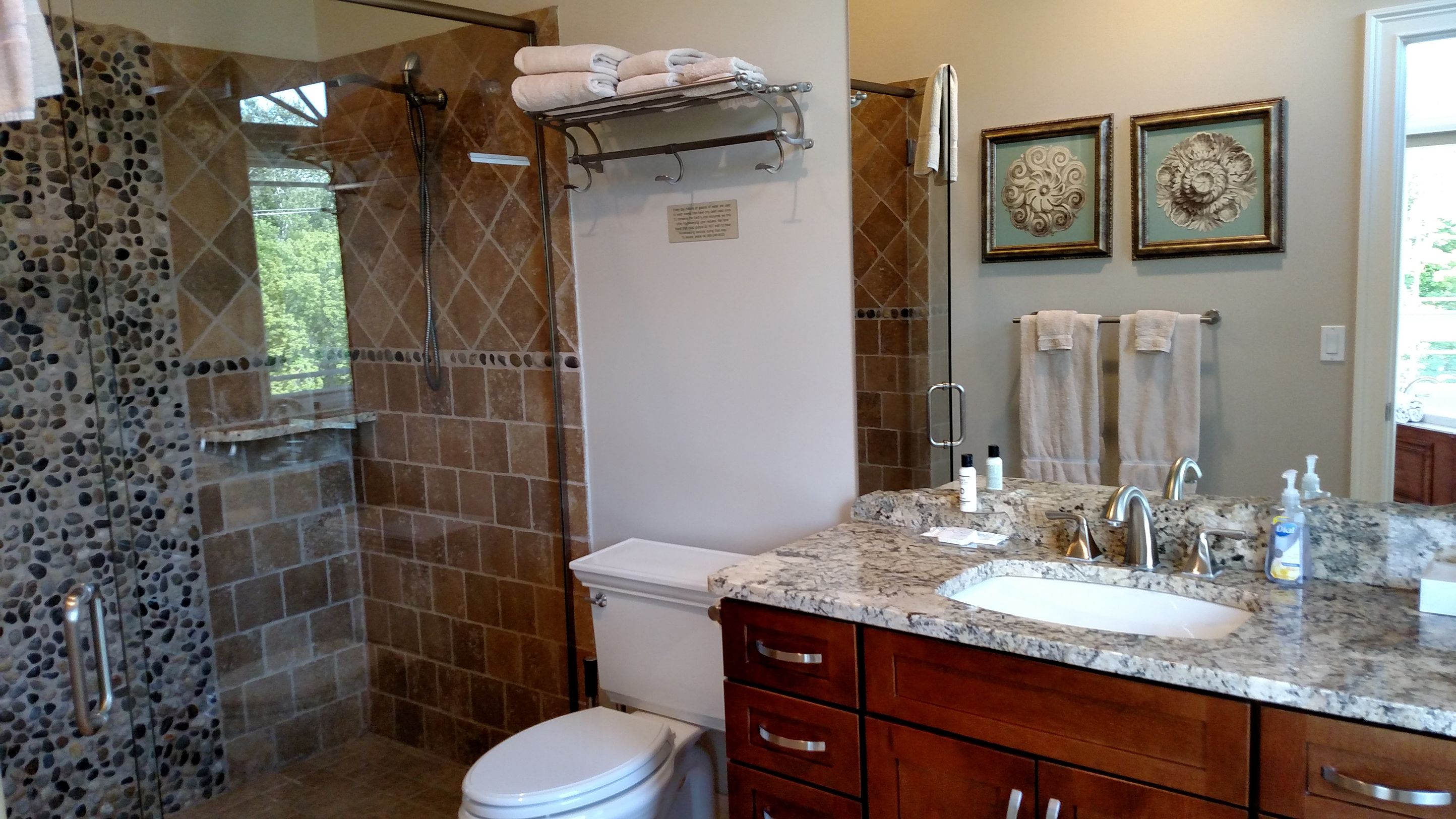 luxury condo, multiple beds, river view | bathroom | hair dryer, towels