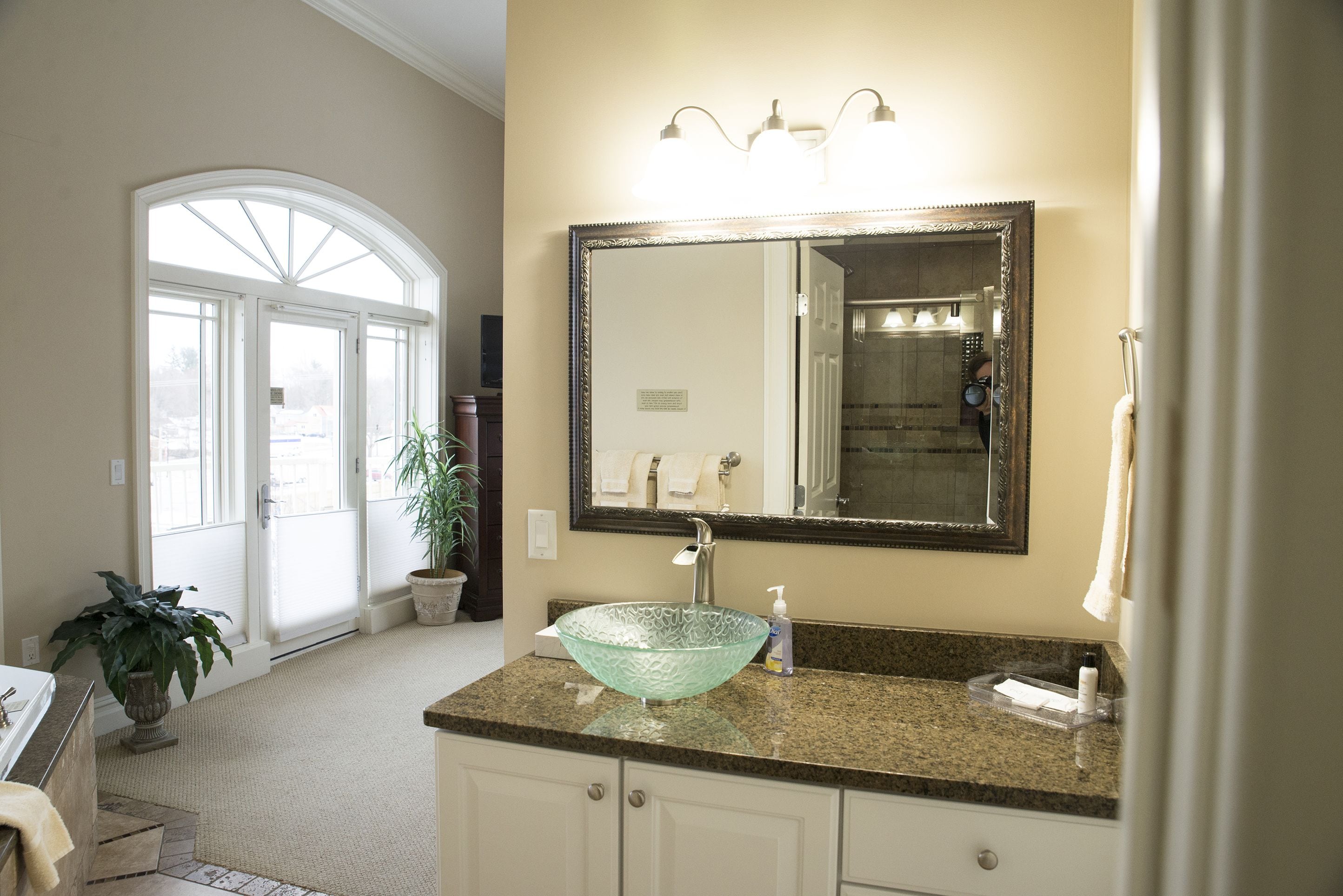 luxury condo, multiple beds, river view | bathroom | hair dryer, towels