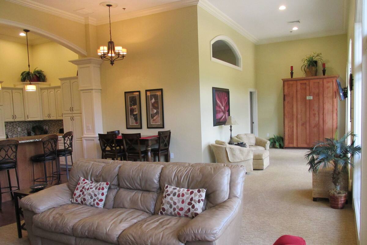 Luxury Condo, Multiple Beds, River View | Living area | Smart TV