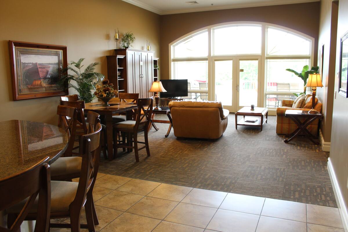 Luxury Condo, Multiple Beds | Living area | Smart TV