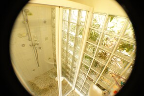 Bathtub, eco-friendly toiletries, hair dryer, towels