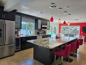 Coffee/tea maker, fridge, microwave, oven