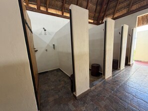 Shower, rainfall showerhead, towels, shampoo