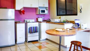 Family Apartment, Multiple Beds, Garden View | Private kitchen | Fridge, microwave, oven, stovetop